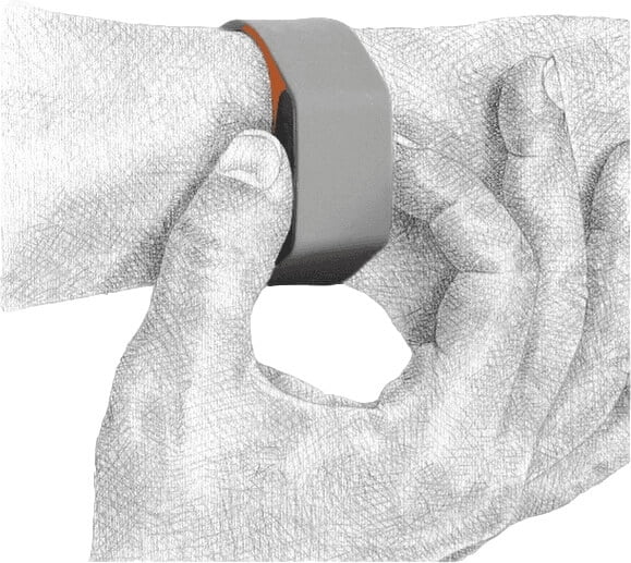 Squeezing the side buttons of the Acticheck wristband to call for help